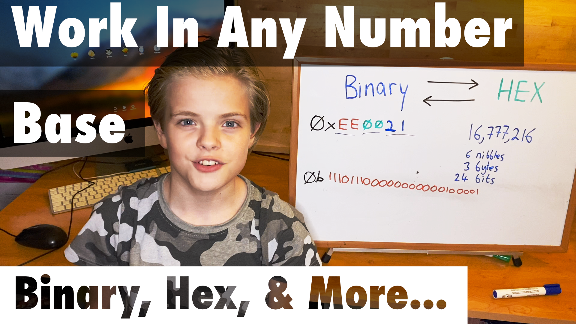 boy with whiteboard explaining number bases