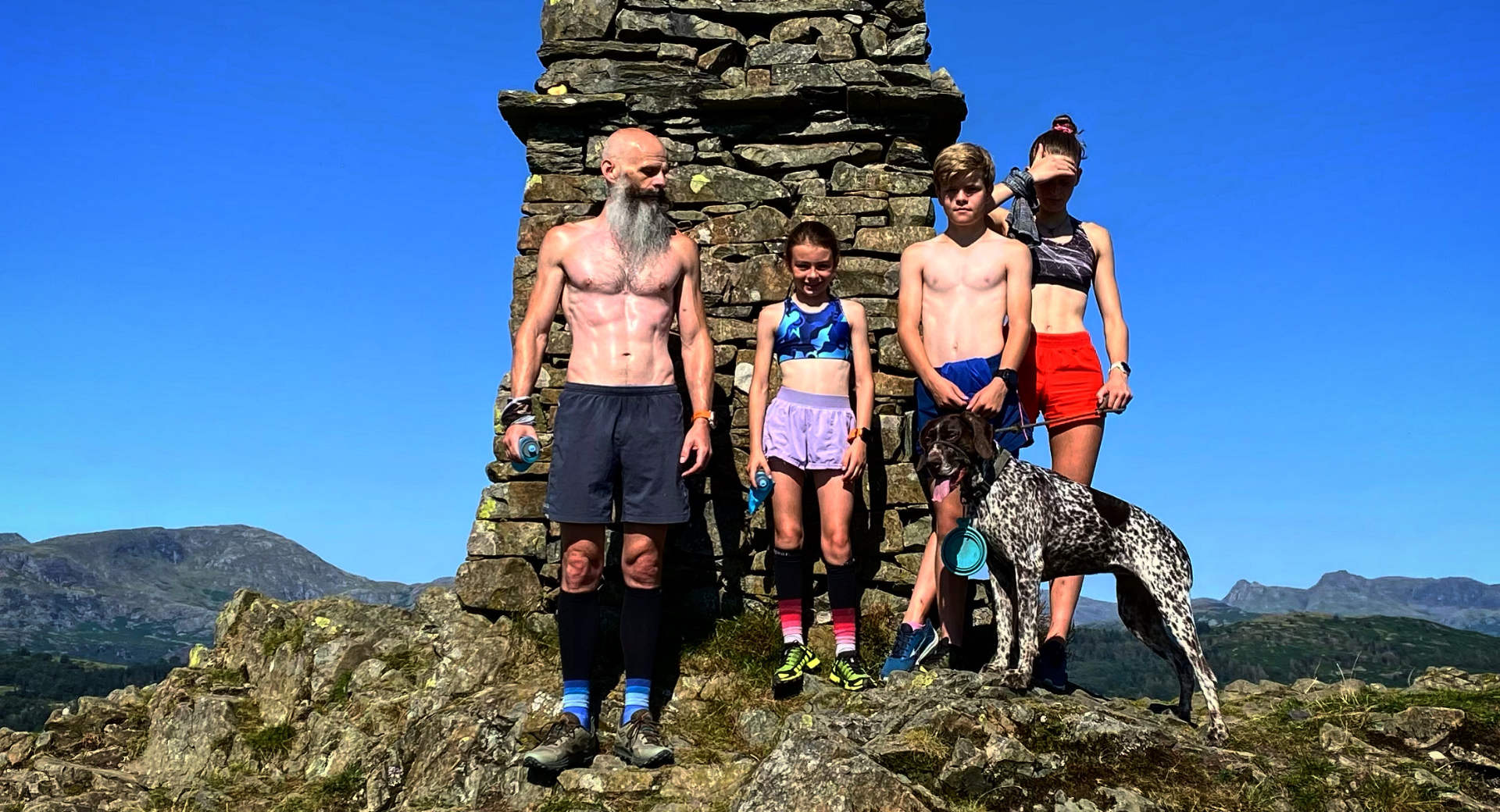 family of fell runners and dog