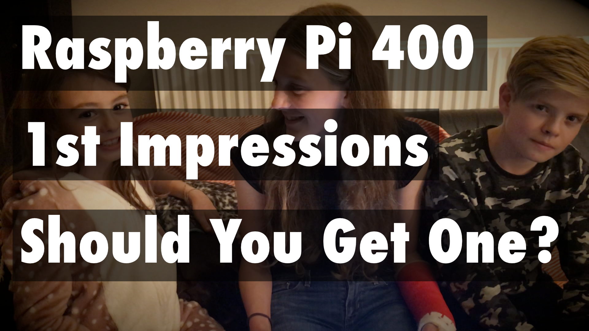 raspberry pi 400 computer and 3 kids